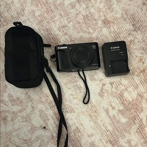 Canon Black Digital Camera with Case and Charger